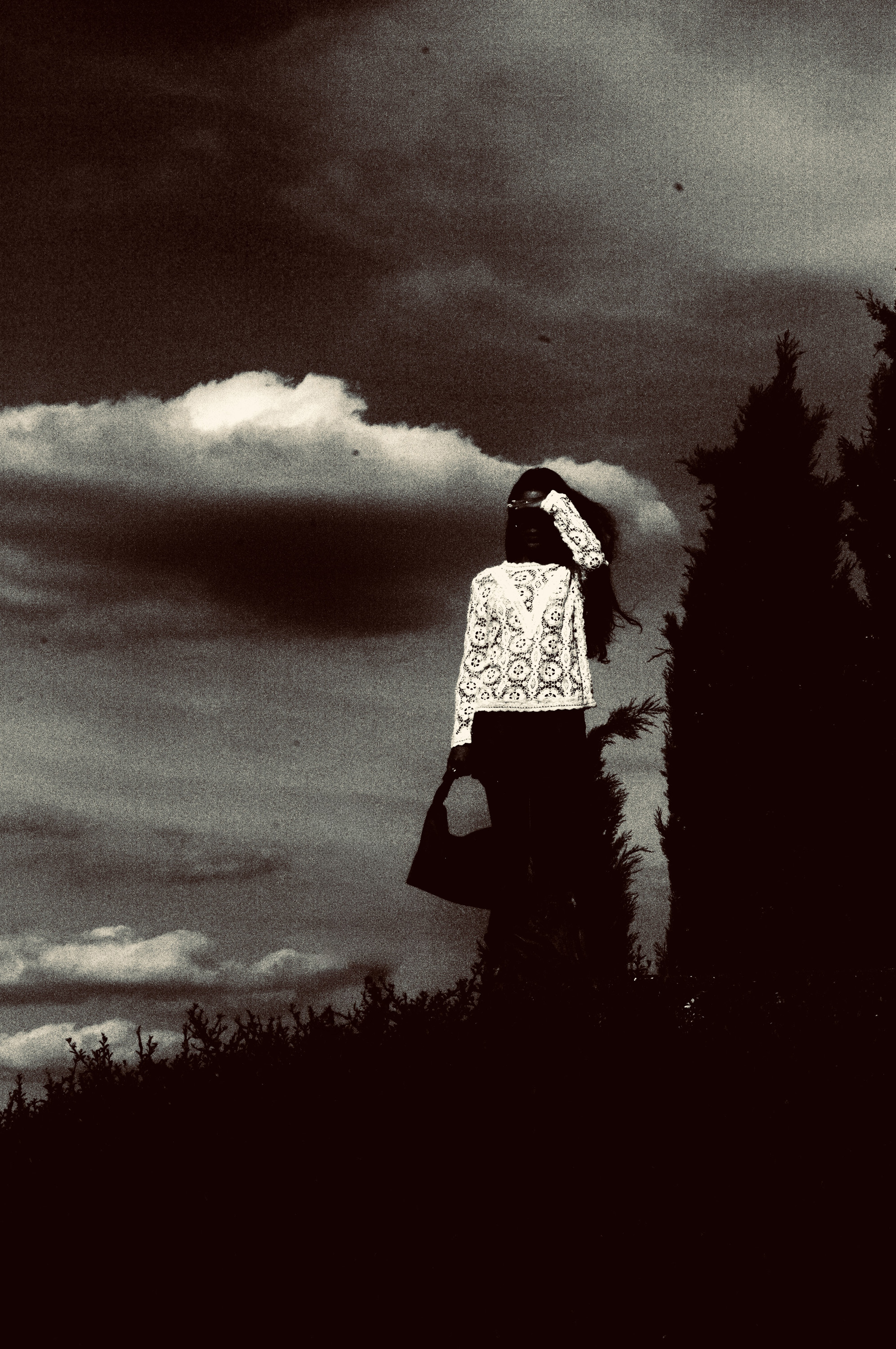 Camerone, silhouette against a stormy sky