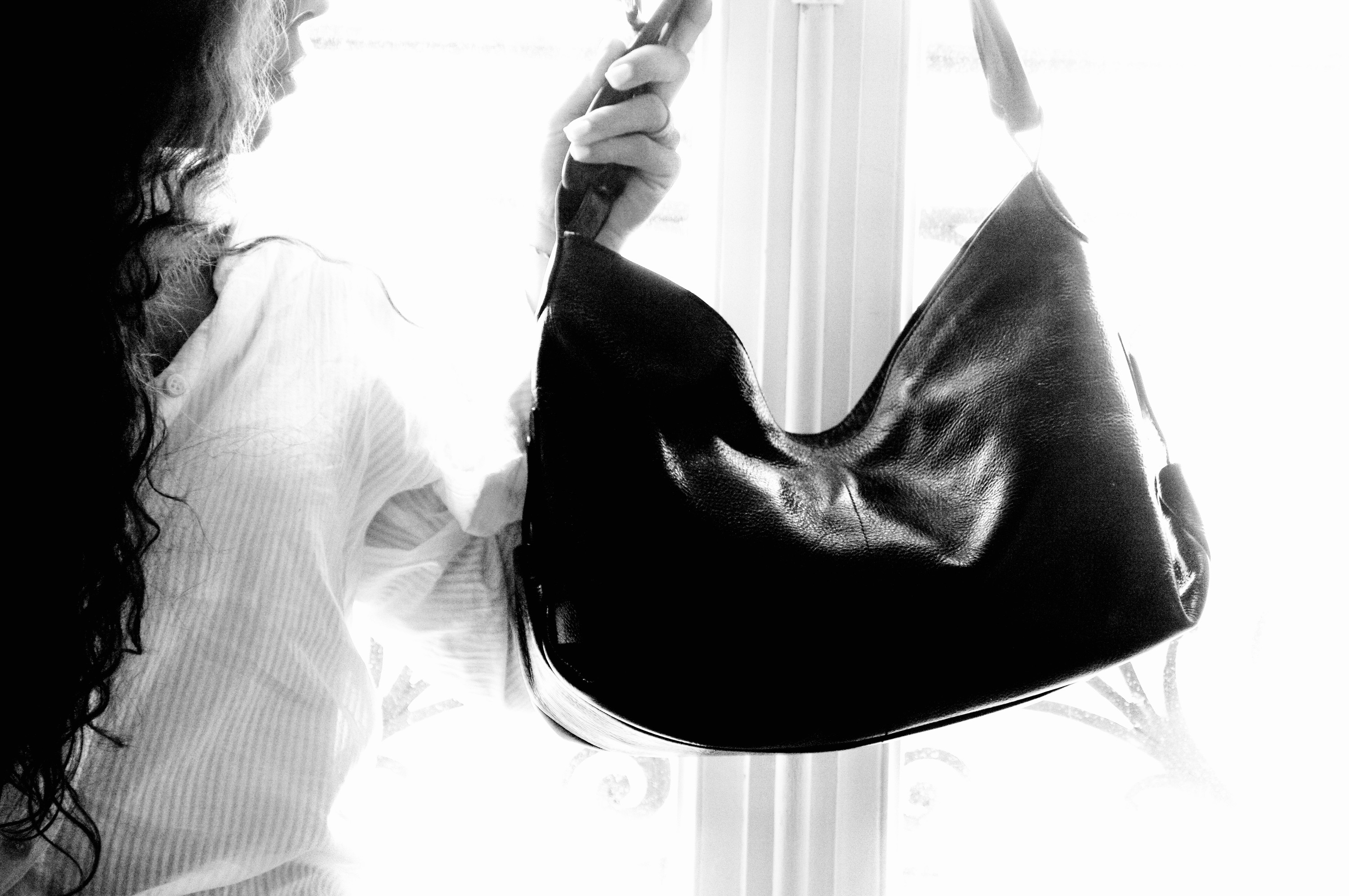 Camerone holding the bag against the light