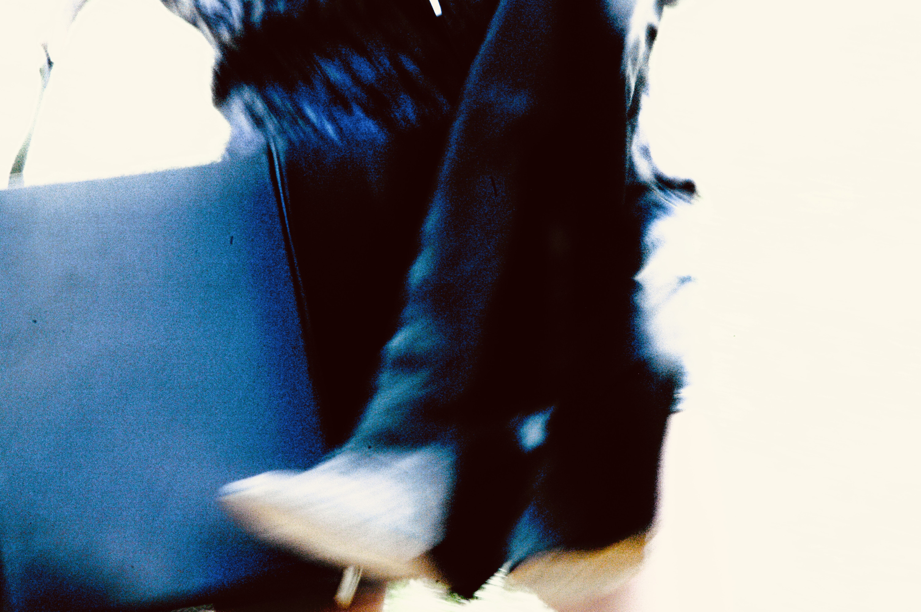 Walking, bag in hand — motion blur