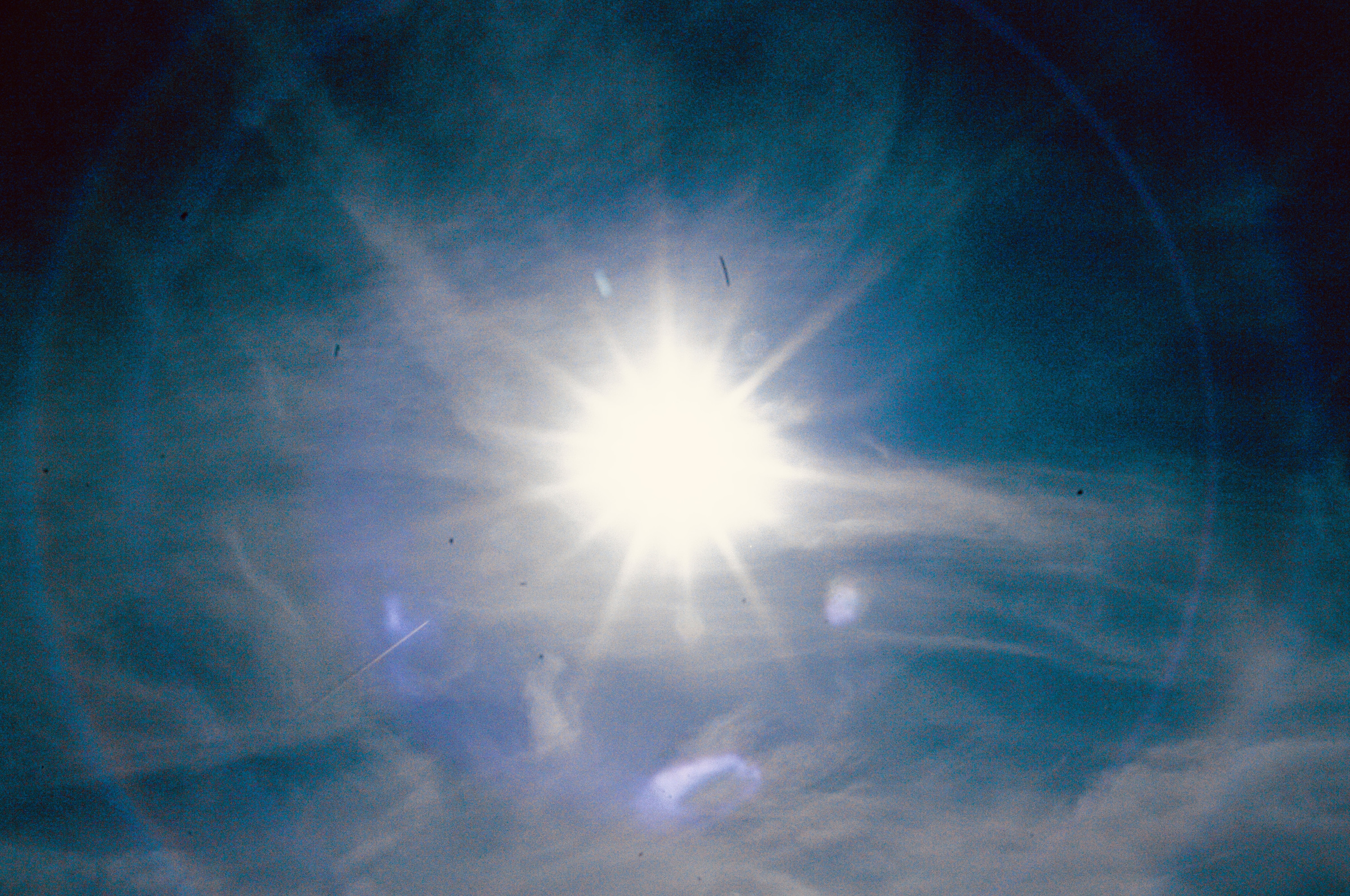 Sun flare through the clouds